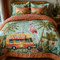 Flamingo Camping quilted 3-piece bedding set on a made bed with two matching pillow shams
