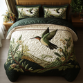 Flight Of Joy Animal quilted 3-piece bedding set on a made bed with two matching pillow shams