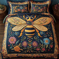 Floral Bee quilted 3-piece bedding set on a made bed with two matching pillow shams