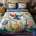 Floral Essence Animal quilted 3-piece bedding set on a made bed with two matching pillow shams