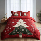 Frost Garden Christmas quilted 3-piece bedding set on a made bed with two matching pillow shams