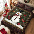 Frosted Joy Christmas Tree quilted 3-piece bedding set on a made bed with two matching pillow shams