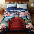 Fuji Blossom Breeze quilted 3-piece bedding set on a made bed with two matching pillow shams