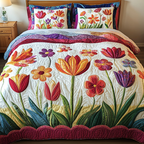 Garden Whimsy Floral quilted 3-piece bedding set on a made bed with two matching pillow shams