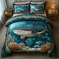 Gentle Giant Ocean quilted 3-piece bedding set on a made bed with two matching pillow shams