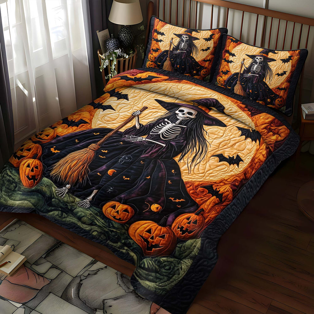Ghostly Gathering quilted 3-piece bedding set on a made bed with two matching pillow shams