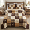 Golden Harvest Cottage quilted 3-piece bedding set on a made bed with two matching pillow shams