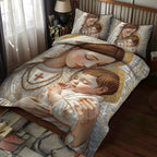 Graceful Adoration quilted 3-piece bedding set on a made bed with two matching pillow shams
