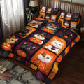 Halloween Cat quilted 3-piece bedding set on a made bed with two matching pillow shams