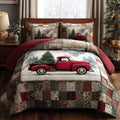 Holiday Haul Christmas quilted 3-piece bedding set on a made bed with two matching pillow shams