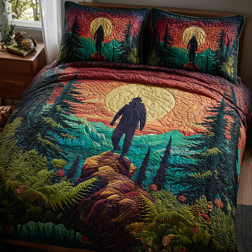 Horizon Hiker quilted 3-piece bedding set on a made bed with two matching pillow shams