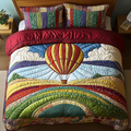 Horizon Lift quilted 3-piece bedding set on a made bed with two matching pillow shams