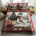 Husky Christmas Spirit quilted 3-piece bedding set on a made bed with two matching pillow shams