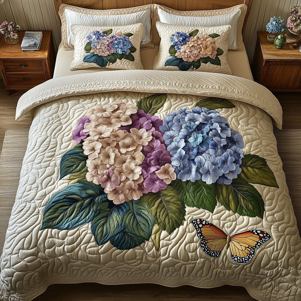Hydrangea Bloom Elegance quilted 3-piece bedding set on a made bed with two matching pillow shams