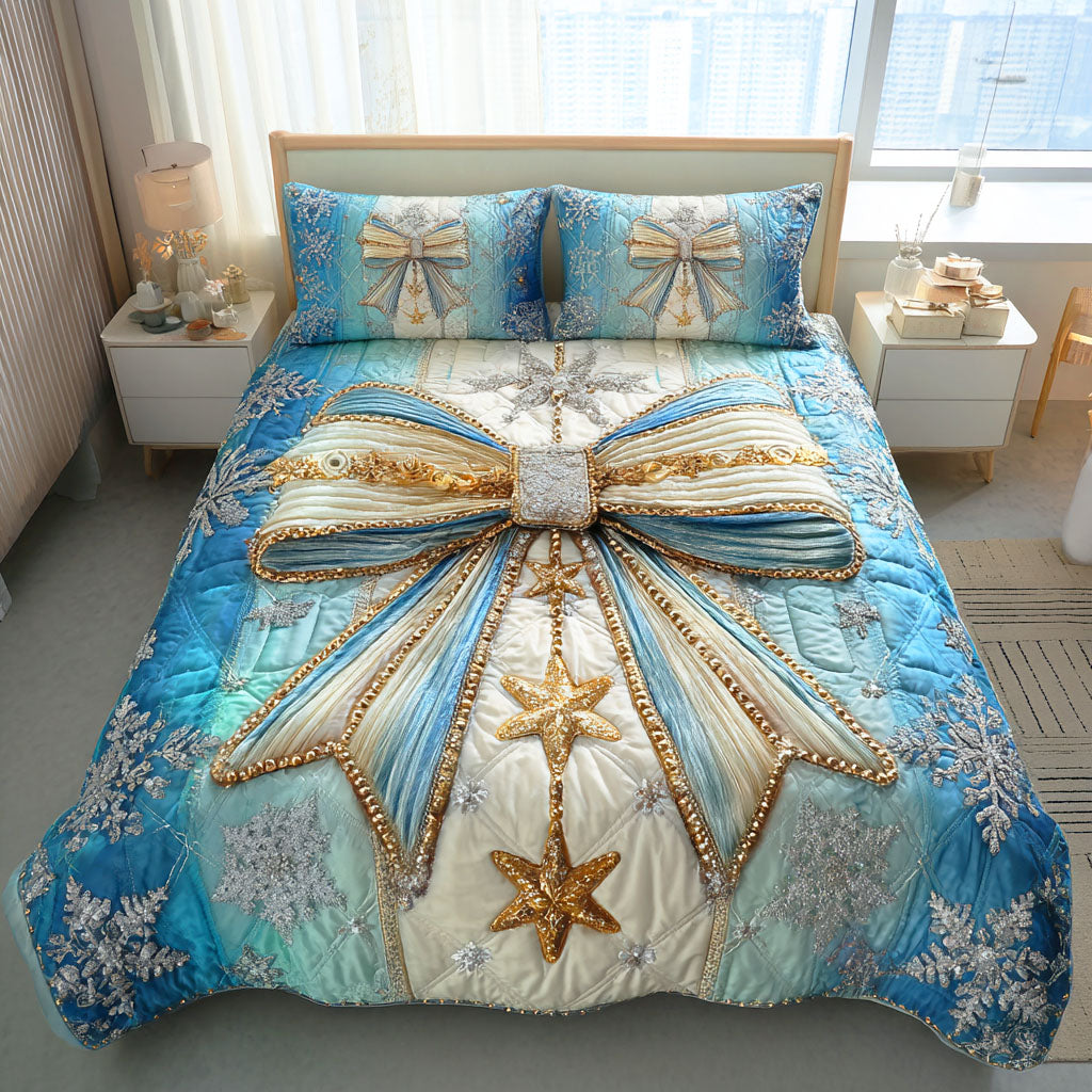 Icy Ribbon Grace quilted 3-piece bedding set on a made bed with two matching pillow shams