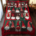Jolly Gnome Christmas quilted 3-piece bedding set on a made bed with two matching pillow shams