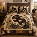 Lone Star Saddle quilted 3-piece bedding set on a made bed with two matching pillow shams