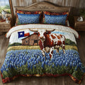 Longhorn Dreams quilted 3-piece bedding set on a made bed with two matching pillow shams