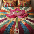 Lotus Grace quilted 3-piece bedding set on a made bed with two matching pillow shams