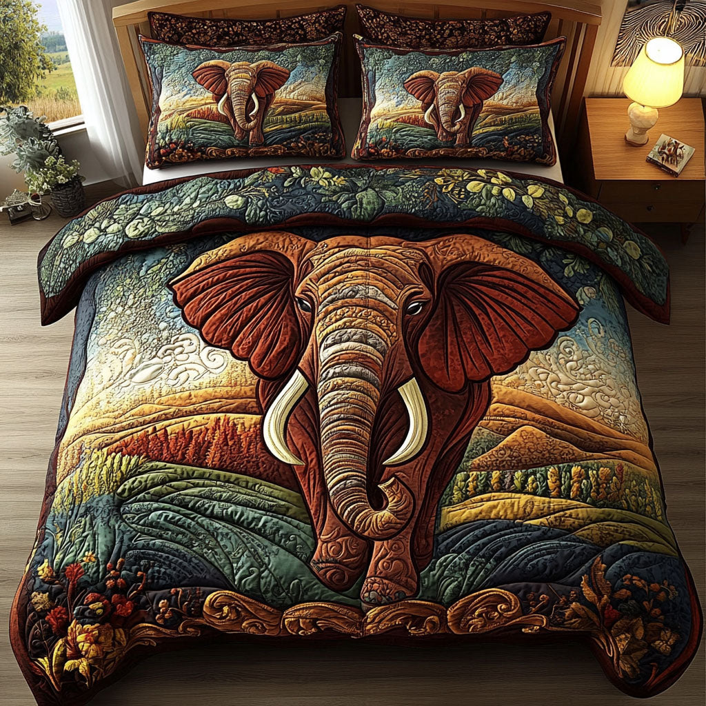 Majestic Elephant Dream quilted 3-piece bedding set on a made bed with two matching pillow shams