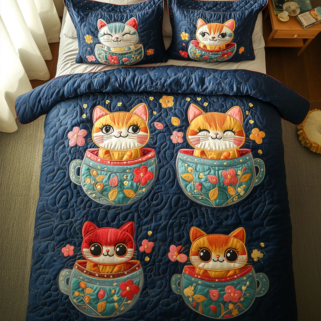 Meow Tea Party quilted 3-piece bedding set on a made bed with two matching pillow shams
