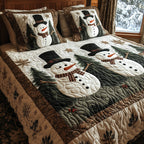 Merry Frost Snowman quilted 3-piece bedding set on a made bed with two matching pillow shams