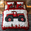 Merry Monster Truck quilted 3-piece bedding set on a made bed with two matching pillow shams
