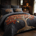Midnight Canopy quilted 3-piece bedding set on a made bed with two matching pillow shams
