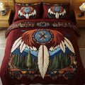 Moonlit Dream quilted 3-piece bedding set on a made bed with two matching pillow shams