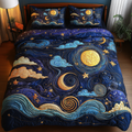 Moonlit Dreams quilted 3-piece bedding set on a made bed with two matching pillow shams