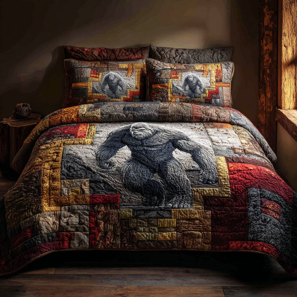 Nightwalker quilted 3-piece bedding set on a made bed with two matching pillow shams