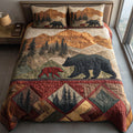 Northern Bear quilted 3-piece bedding set on a made bed with two matching pillow shams