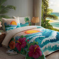 Ocean Sunset quilted 3-piece bedding set on a made bed with two matching pillow shams