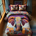 Orange Elephant Harmony quilted 3-piece bedding set on a made bed with two matching pillow shams