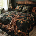 Orange Eternal Roots Tree Of Life quilted 3-piece bedding set on a made bed with two matching pillow shams