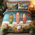 Orange Ocean Breeze Aloha quilted 3-piece bedding set on a made bed with two matching pillow shams