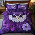 Owl Design quilted 3-piece bedding set on a made bed with two matching pillow shams