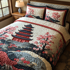 Pagoda Bloom Cherry Blossom quilted 3-piece bedding set on a made bed with two matching pillow shams