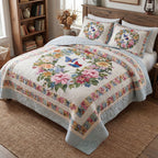 Pastel Garden Dream quilted 3-piece bedding set on a made bed with two matching pillow shams