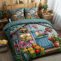 Petal Haven quilted 3-piece bedding set on a made bed with two matching pillow shams