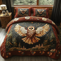 Red Owl quilted 3-piece bedding set on a made bed with two matching pillow shams