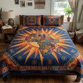 Rising Sun quilted 3-piece bedding set on a made bed with two matching pillow shams