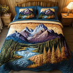 Riverlight Peaks quilted 3-piece bedding set on a made bed with two matching pillow shams