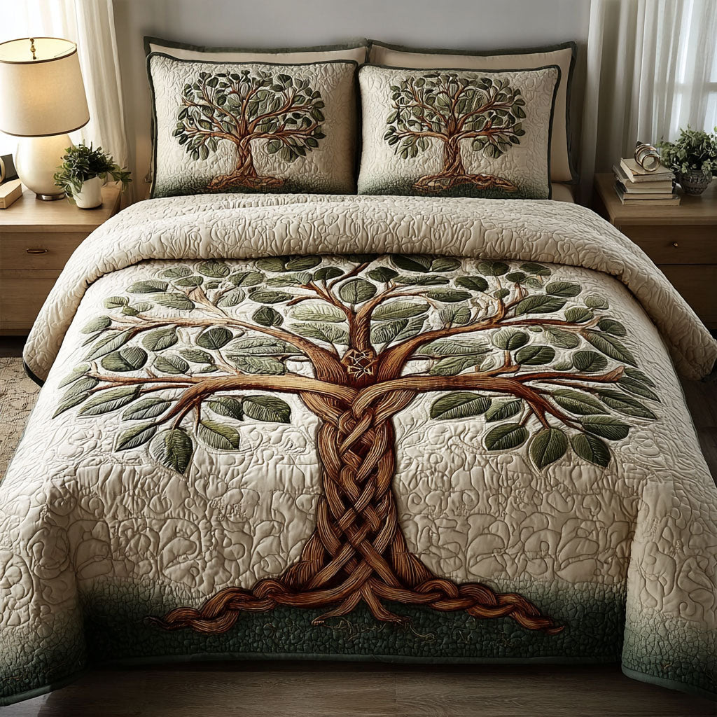 Rooted Glow Tree Of Life quilted 3-piece bedding set on a made bed with two matching pillow shams
