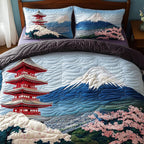 Sacred Mountain View quilted 3-piece bedding set on a made bed with two matching pillow shams