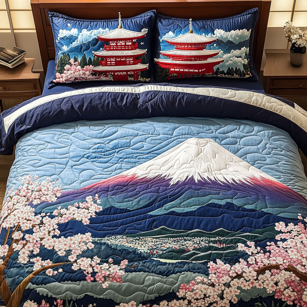 Sacred Peaks quilted 3-piece bedding set on a made bed with two matching pillow shams