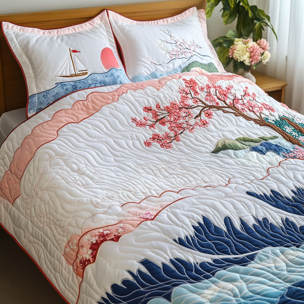 Sakura Waves quilted 3-piece bedding set on a made bed with two matching pillow shams