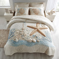 Sandy Ocean Bed quilted 3-piece bedding set on a made bed with two matching pillow shams