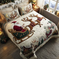 Santa Sleigh Ride quilted 3-piece bedding set on a made bed with two matching pillow shams
