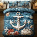 Sea Breeze Haven Anchor quilted 3-piece bedding set on a made bed with two matching pillow shams